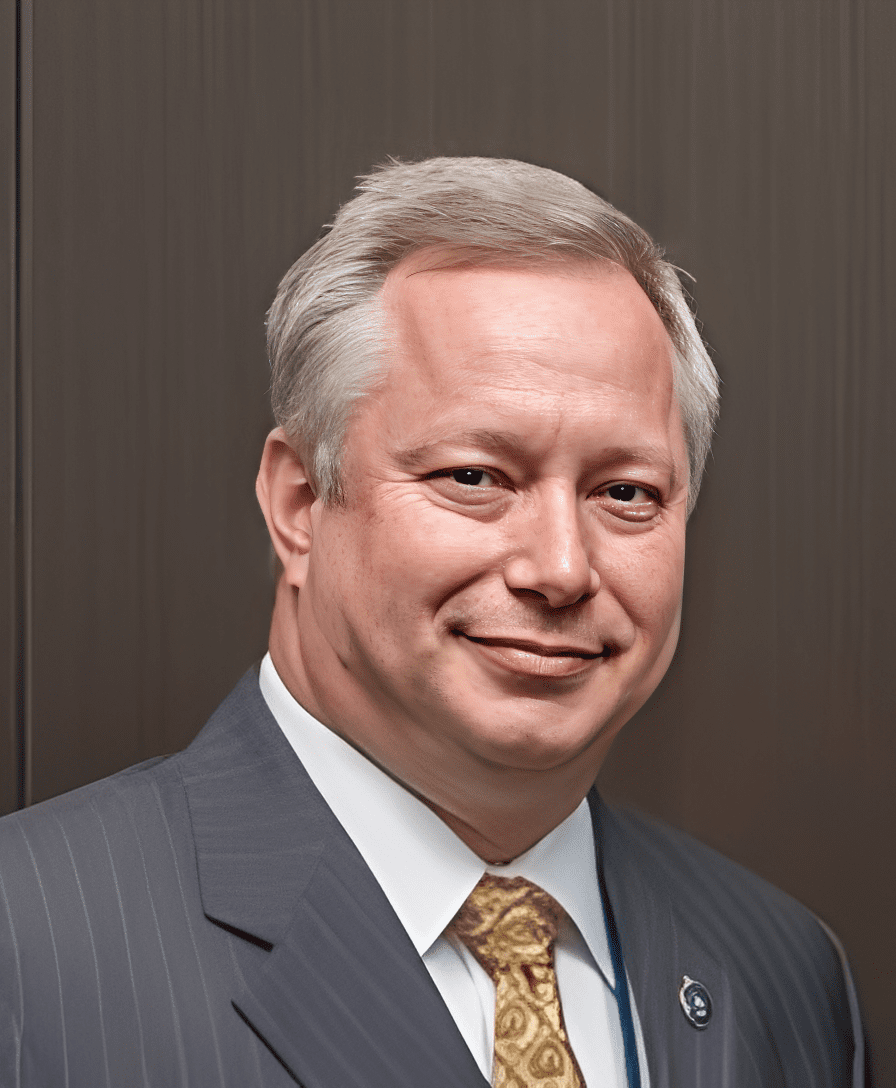 Smiling middle-aged businessman in suit and tie